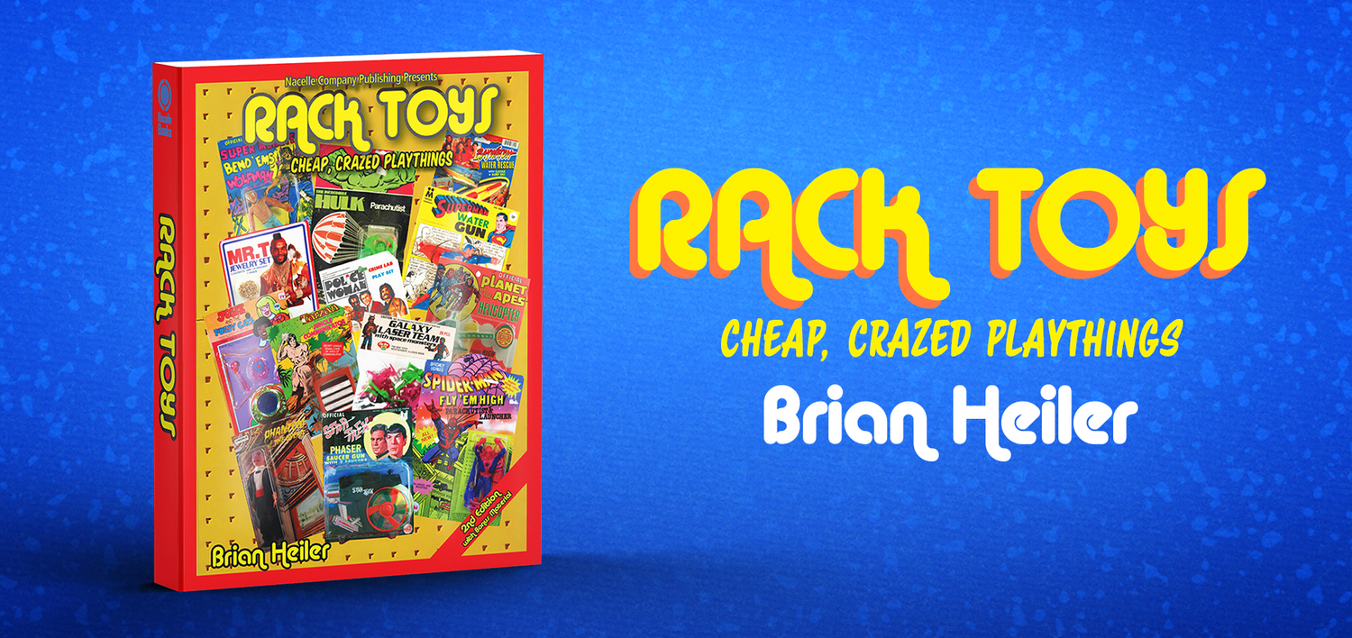 Rack Toys book appears on a blue background. The book's cover is a collage of about 20 different rack toys from various decades.