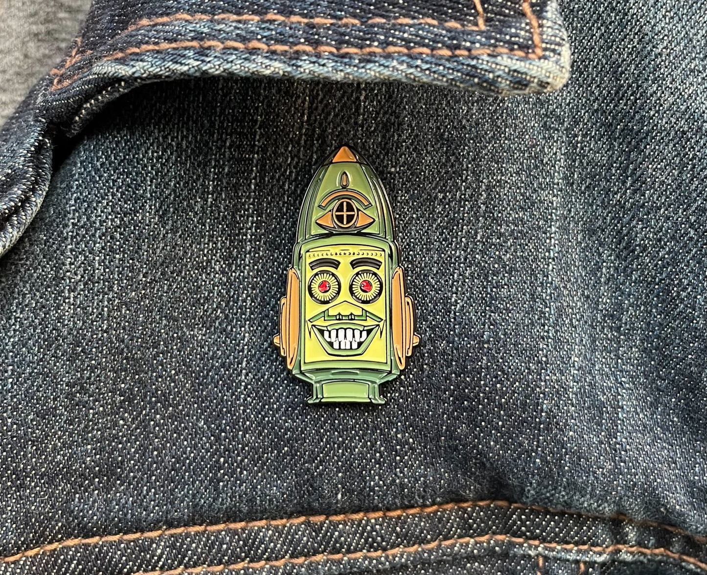 Big Loo Soft Enamel Pin on jean jacket